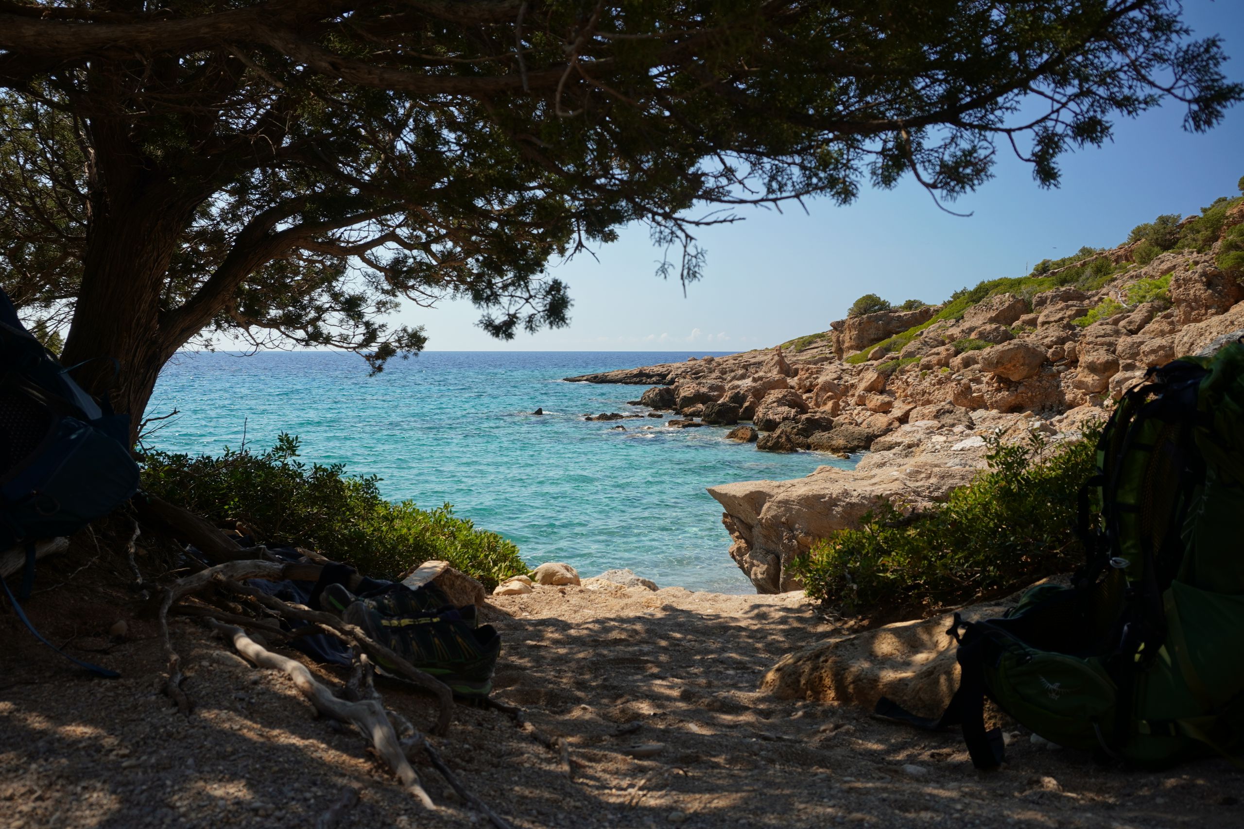 Resting in the shade above tiny Astropelekita beach, Greece
