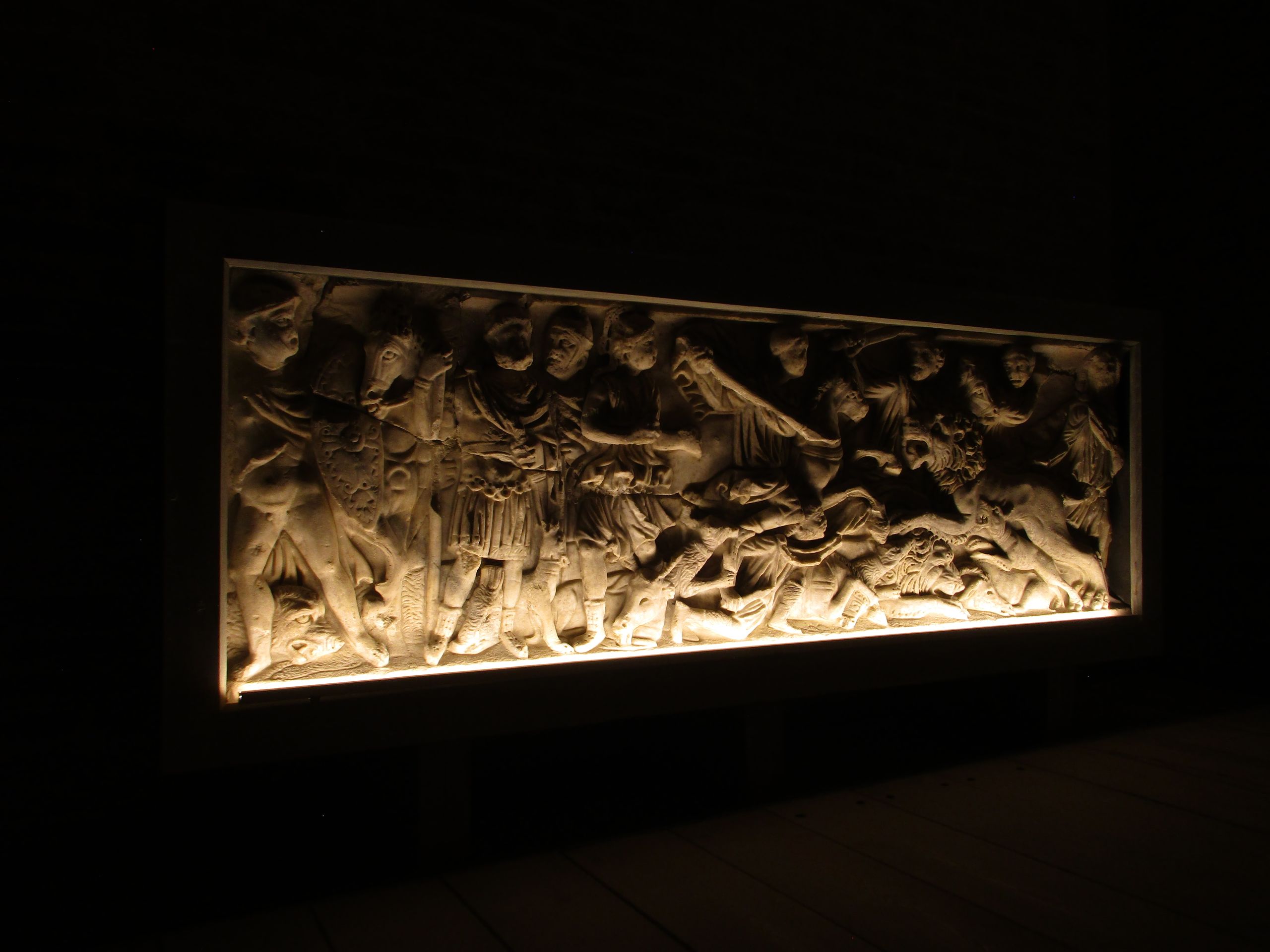 Nicely lit Roman frieze in Siena's archaeological museum, Italy