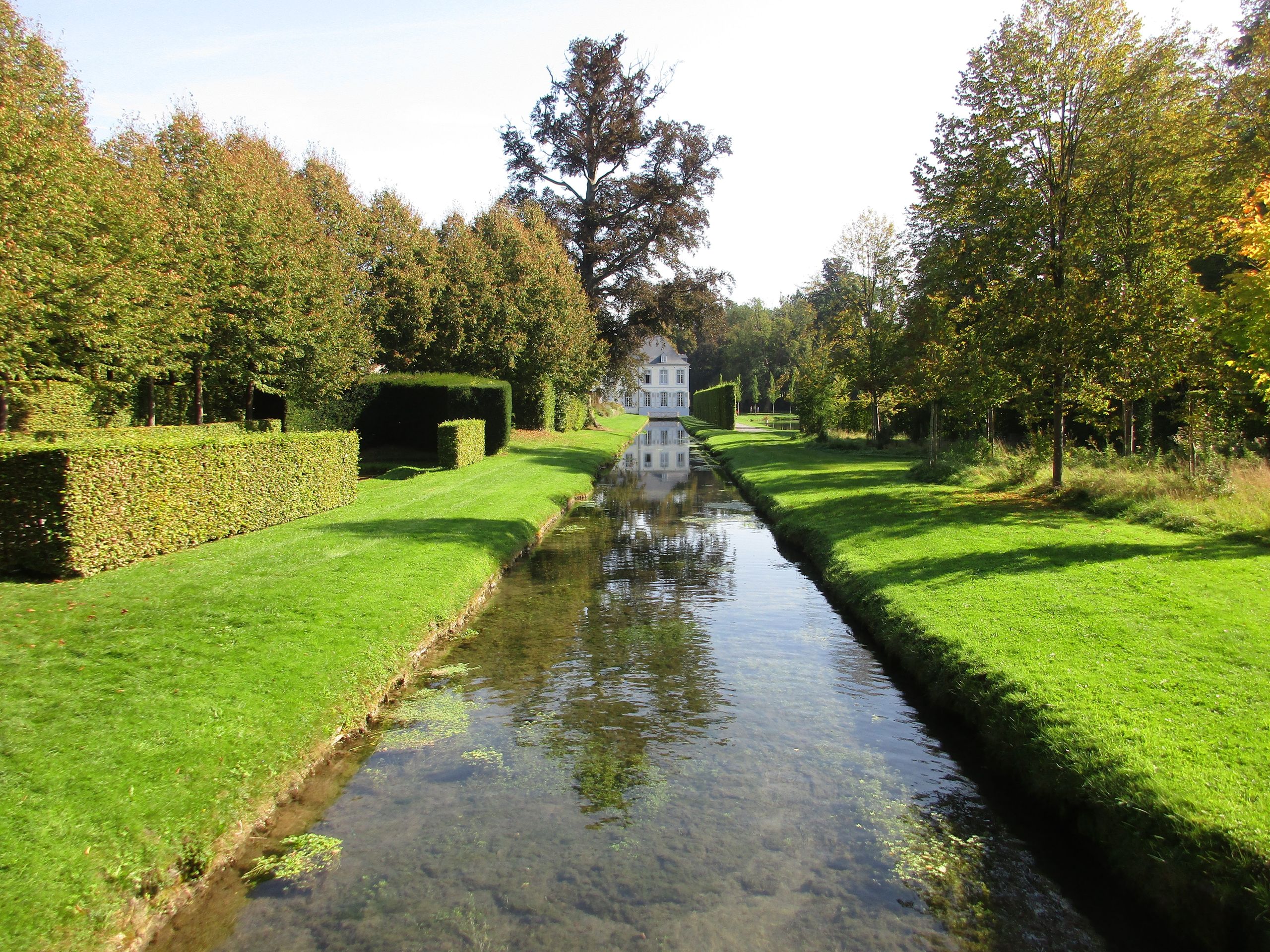 Water reflections in the gardens of Annevoie, Belgium