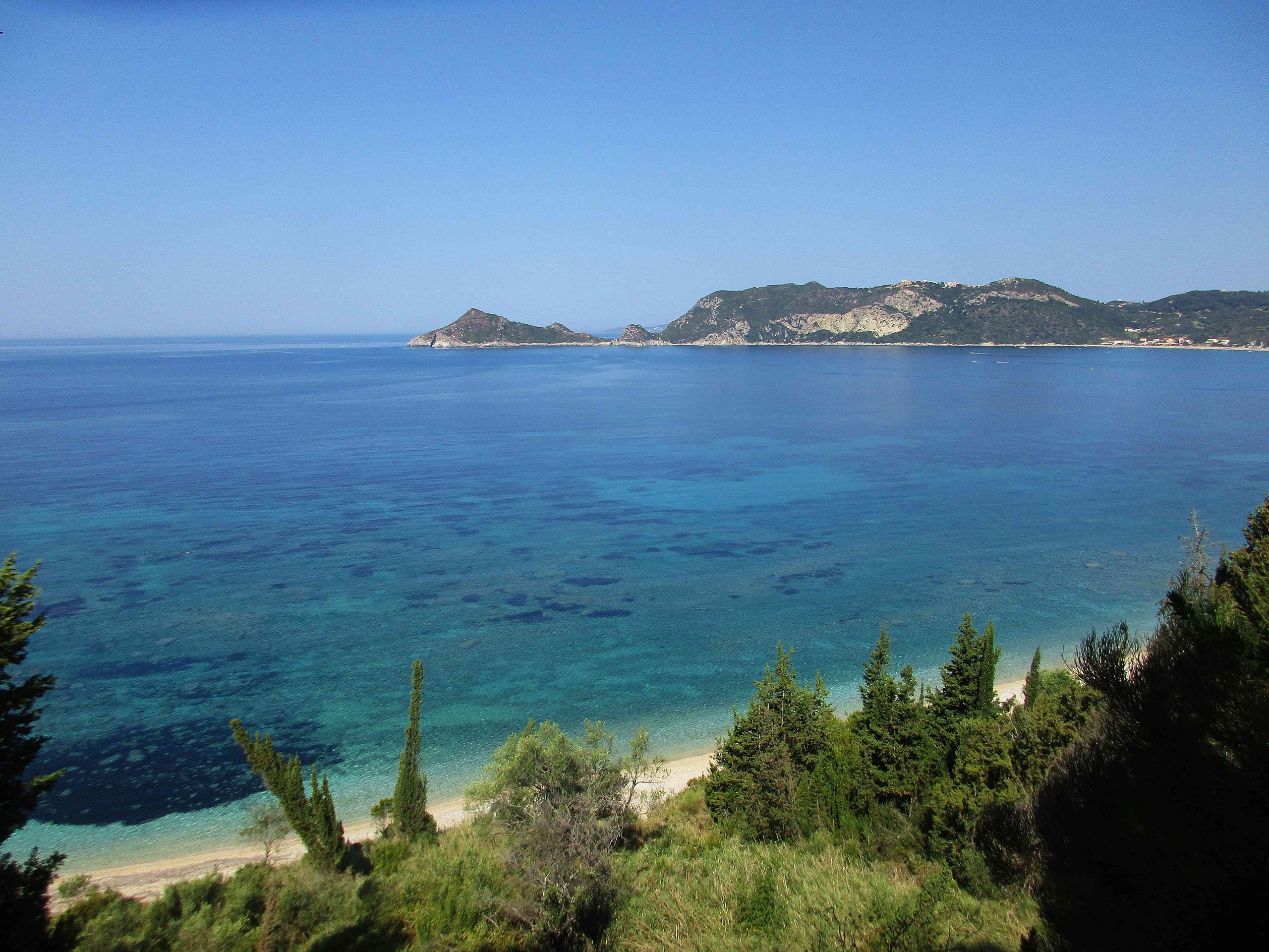 Turquoise waters at the northern coast of Corfu, Greece