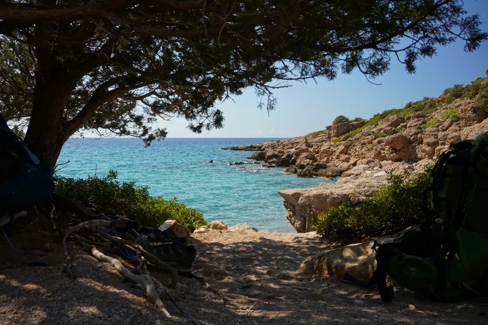 Resting in the shade above tiny Astropelekita beach, Greece