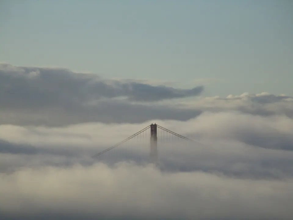 Golden Gate Bridge disappearing in fog, California, USA