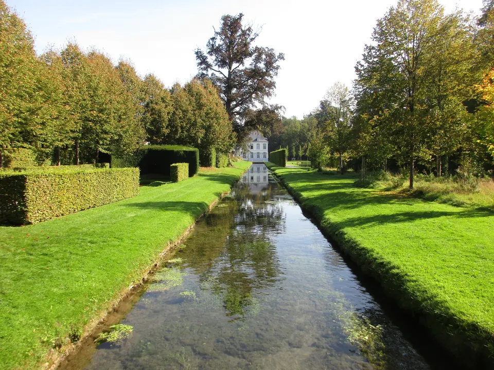 Water reflections in the gardens of Annevoie, Belgium